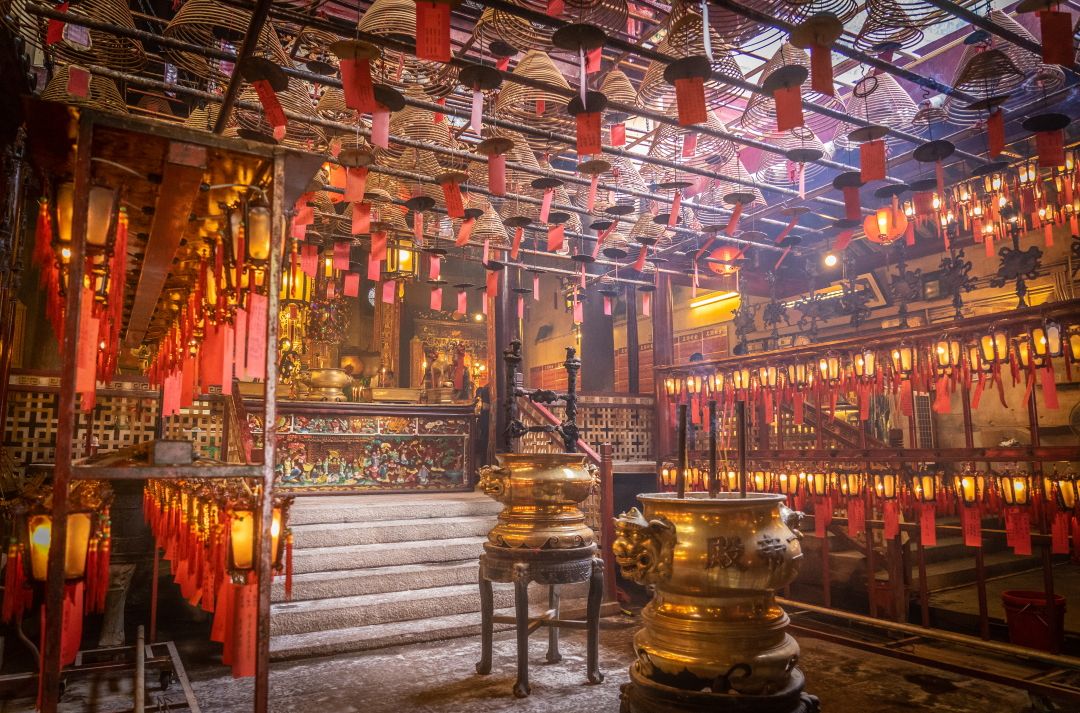 Interior rituals at Man Mo Temple